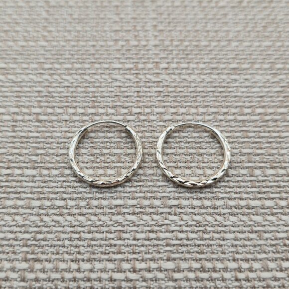 Sterling Silver Textured Small Hoop Earrings A5762 - Picture 1 of 6